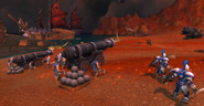 The Stormwind Army landing on the beaches with cannons and infantrymen.