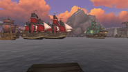 Irontide ships sail into Boralus Harbor as the First Fleet scrambles its ships to counter them.