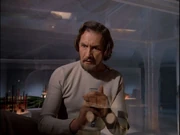 Simmonds learns he's doomed.