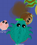 A Bigfoot being bullied by a Sea Monster with a Stinky Pig watching.