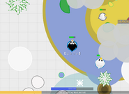 A Penguin swimming in a Lake.