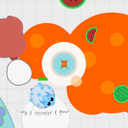 An Ice Monster perched on a hill next to an Arctic Volcano.