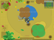 A Bison near two Komodo Dragons, with the low water circle and the old water bar displaying that it is lacking water