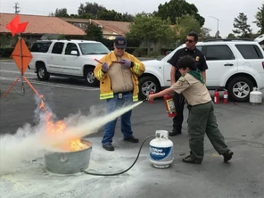 John Hurst, Boy Scout merit badge counselor, teaches fire safety in his class