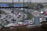 Plenty of cars travelling on the Orbital Moatway - today's London M25.