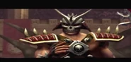 Shao Kahn pensa no que fazer com Liu Kang e Kung Lao