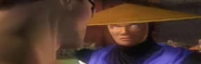 A reação de Raiden ao ver Johnny Cage pedindo para "premiá-lo".
