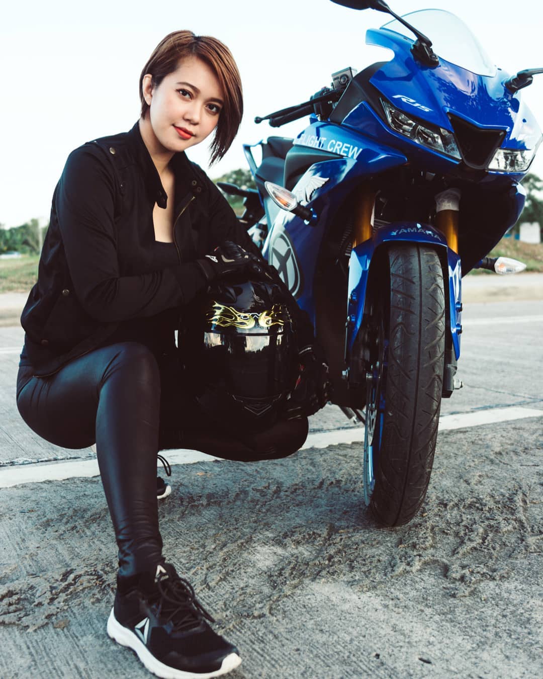 Edmerlyn Saballa a Filipina flight attendant and a motorcycle rider ...