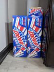 Photograph of two 2021 12-packs of Dew-S-A.