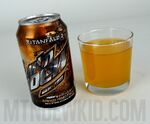 A can of Game Fuel (Mango Heat), with its contents poured into a cup. Photograph courtesy of MtnDewKid.com.