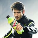 Promotional poster for Indian Mountain Dew, featuring Indian Telugu actor Mahesh Babu as well as Mountain Dew's Indian 600 ml bottle design.