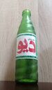 Photograph of a different type of contemporary Arabian Mountain Dew glass bottle.