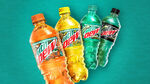 Promotional artwork featuring Baja Blast alongside its Zero Sugar variant, Baja Mango Gem, and Baja Gold.