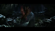 Just when things look bad, Albus Dumbledore's pet phoenix Fawkes intervenes and blinds the killer snake, crippling her lethal gaze.