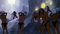 The Sub-humans ready to throw rocks.