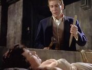 Jonathan Harker (Hammer Horror) and a vampire woman