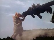 Titanosaurus lifts Godzilla