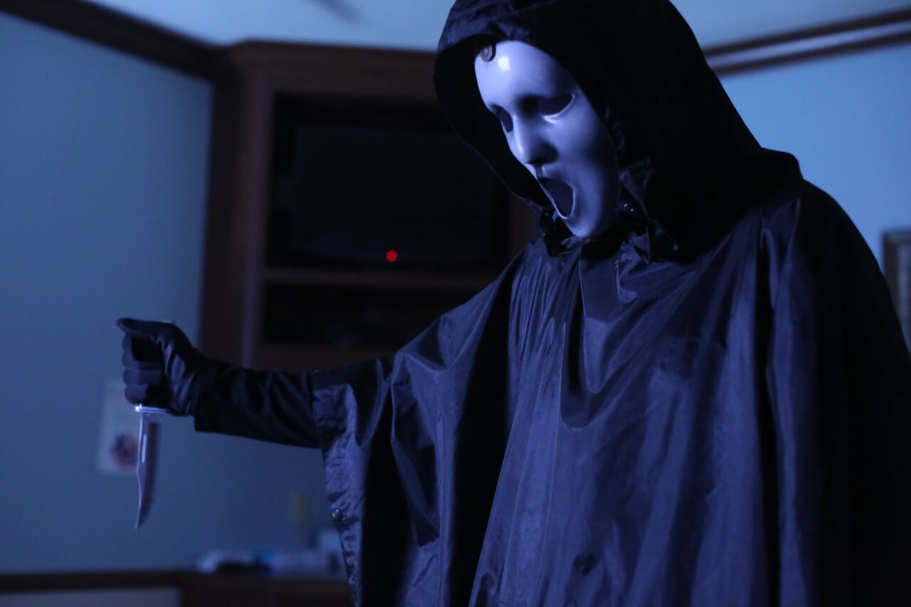 Watch Ghostface dodge bullets and wield a shotgun in a new Scream