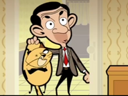 Scrapper smirking at Mr. Bean