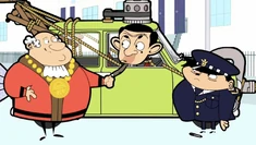 The Mayor congratulating Mr. Bean for cleaning up the city with his machine.