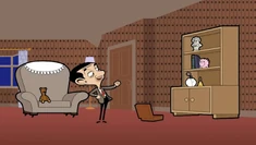 Mr. Bean finally assembled the bookcase and put all the things on the shelves.