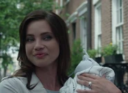 Joanna with her newborn son