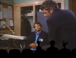 The boys guffaw at Mitchell.