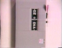 Fuse box door that flips open to the left