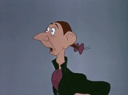 A young Crane putting a turkey on his head.