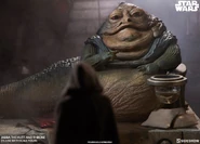 Jabba giving orders to a Jawa.