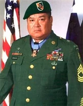 Medal of Honour Recipient, and Army Instructor, Raul Sanchez-Ramirez, wearing the old green Army Service Uniform.
