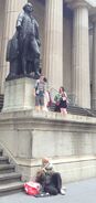 Morgan I's statue above Handy and some kids.