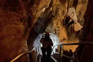 A spelunker exploring the caves the Jupiters used to hide in.