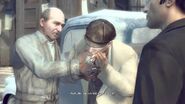 Andy helping Clemenza light the cig.
