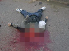 Nikita's corpse. His face has been censored due to gore.
