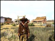 Old gang member standing in front a barn.