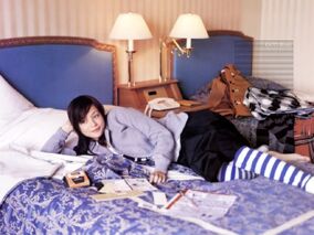 Rosa-kato-on-bed