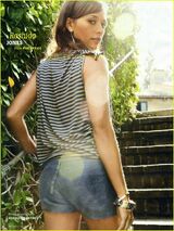 Rashida-jones-in-stripes-sleeveless-with-denim-shorts-all-people-photo-u1