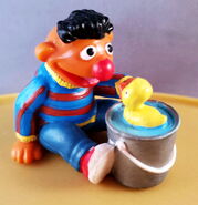 Ernie playing with Rubber Duckie