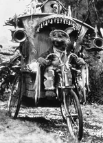 The Storyteller on his wagon bike