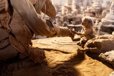 A young Jen being raised by Mystics