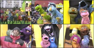 The Sesame Street cast joined by their international counterparts for the 2002 parade.