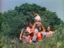 Kids build scarecrow