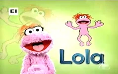 L - Lola (First: Episodio 949)