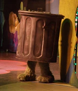 In Sesame Street Live, Oscar would usually enter the stage with his legs sticking out from the bottom of the can.
