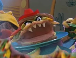 The Angry Sandwich puppet from the "Wasp & Blue-Footed Booby" episode of The Animal Show appears in a fantasy sequence in episode 202.
