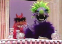 An Anything Muppet (Jim Henson) sings "I Feel Pretty"