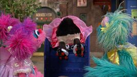 Abby, Rosita, and a penguin playing princess-roller skating in Episode 4212 of Sesame Street.