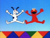 An animated Elmo dances with a dog. (EKA: Episode 3505) (YouTube) Animated by Karen Aqua