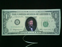 Jim Henson takes the place of Washington on the US $1 bill in Time Piece